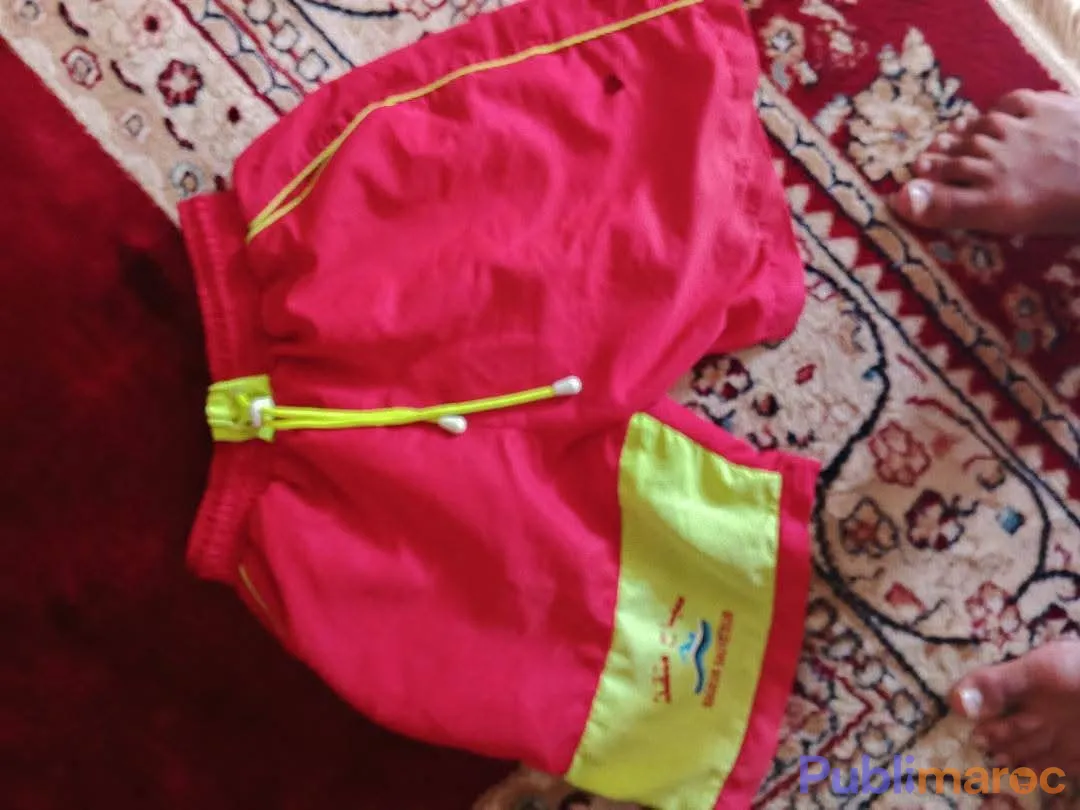 Short de bain rouge et jaune fluo - Nageur Sauveteur / سباح منقذ
